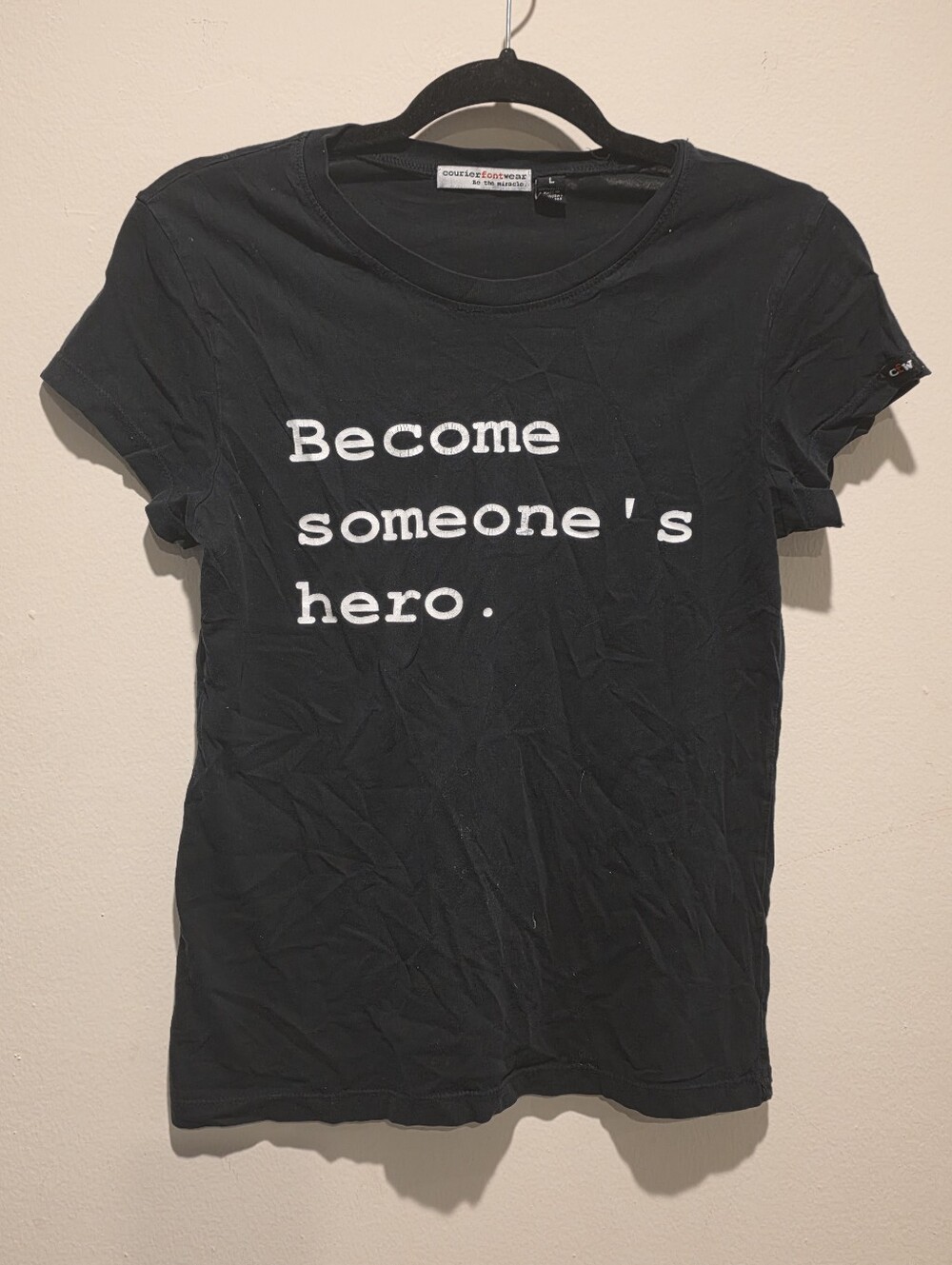 Black Graphic Tee - "Become Someone's Hero."